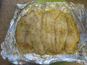 Swai cooked on grill in foil packet