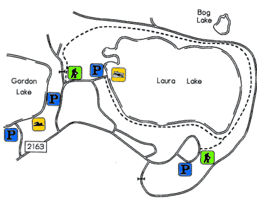 The dashed line is the hiking trail around Laura Lake. It is marked with blue diamonds.
